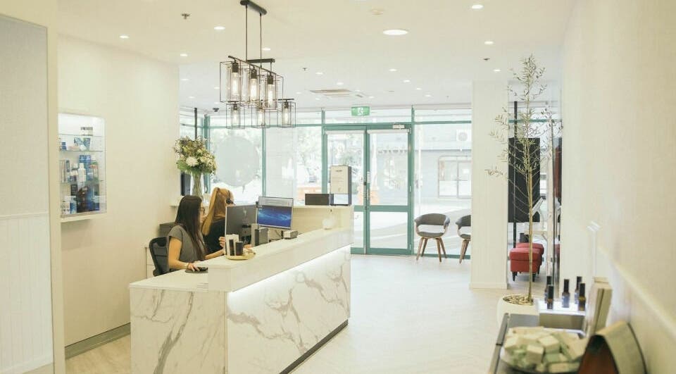 Sophisticated Dermaesthetique reception area in Bondi Junction, New South Wales, AU. Modern decor and welcoming ambiance.