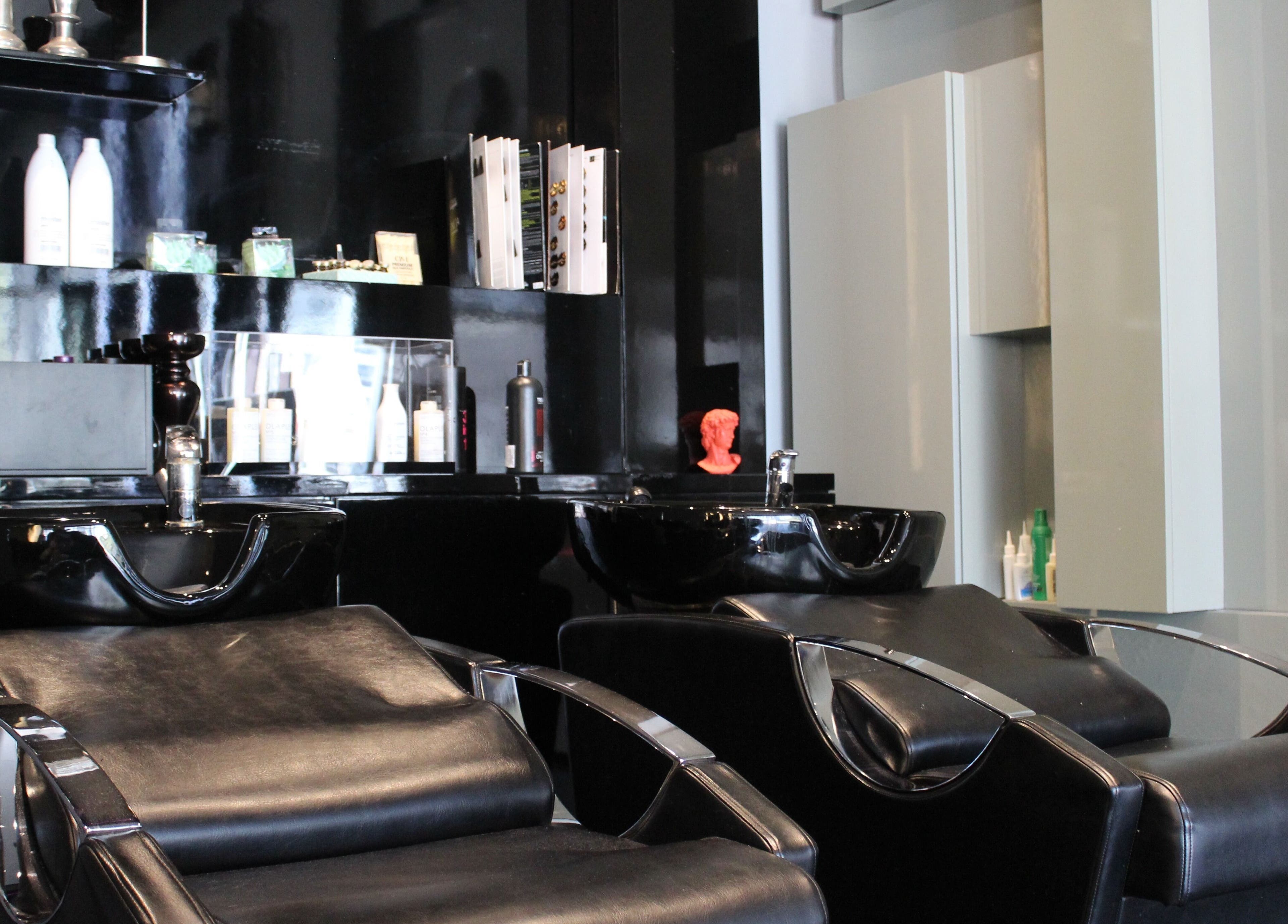 Elegant wash stations at The Gentlemen's Lounge in Dubai, Dubai, AE offering premium hair services.