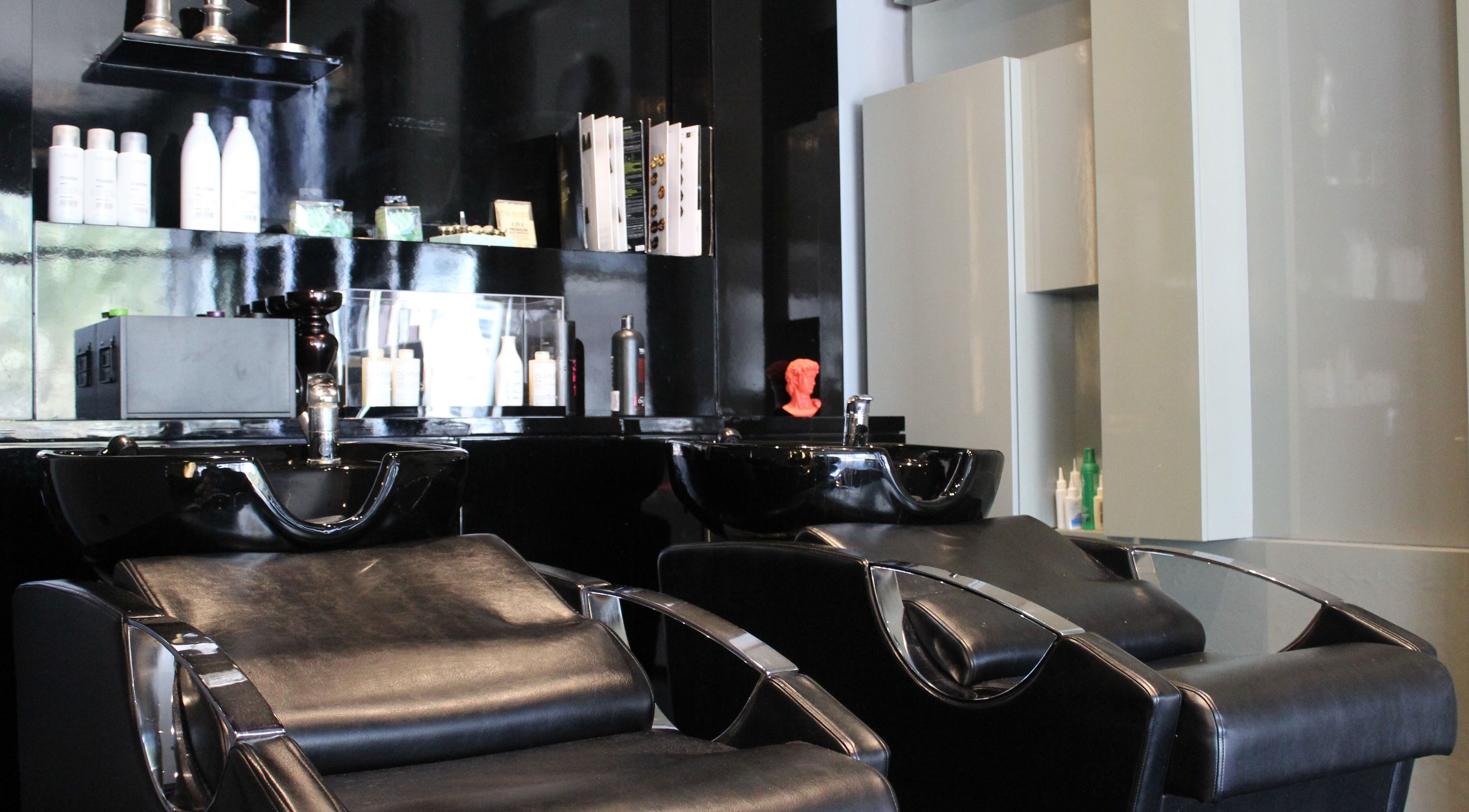 Elegant wash stations at The Gentlemen's Lounge in Dubai, Dubai, AE offering premium hair services.