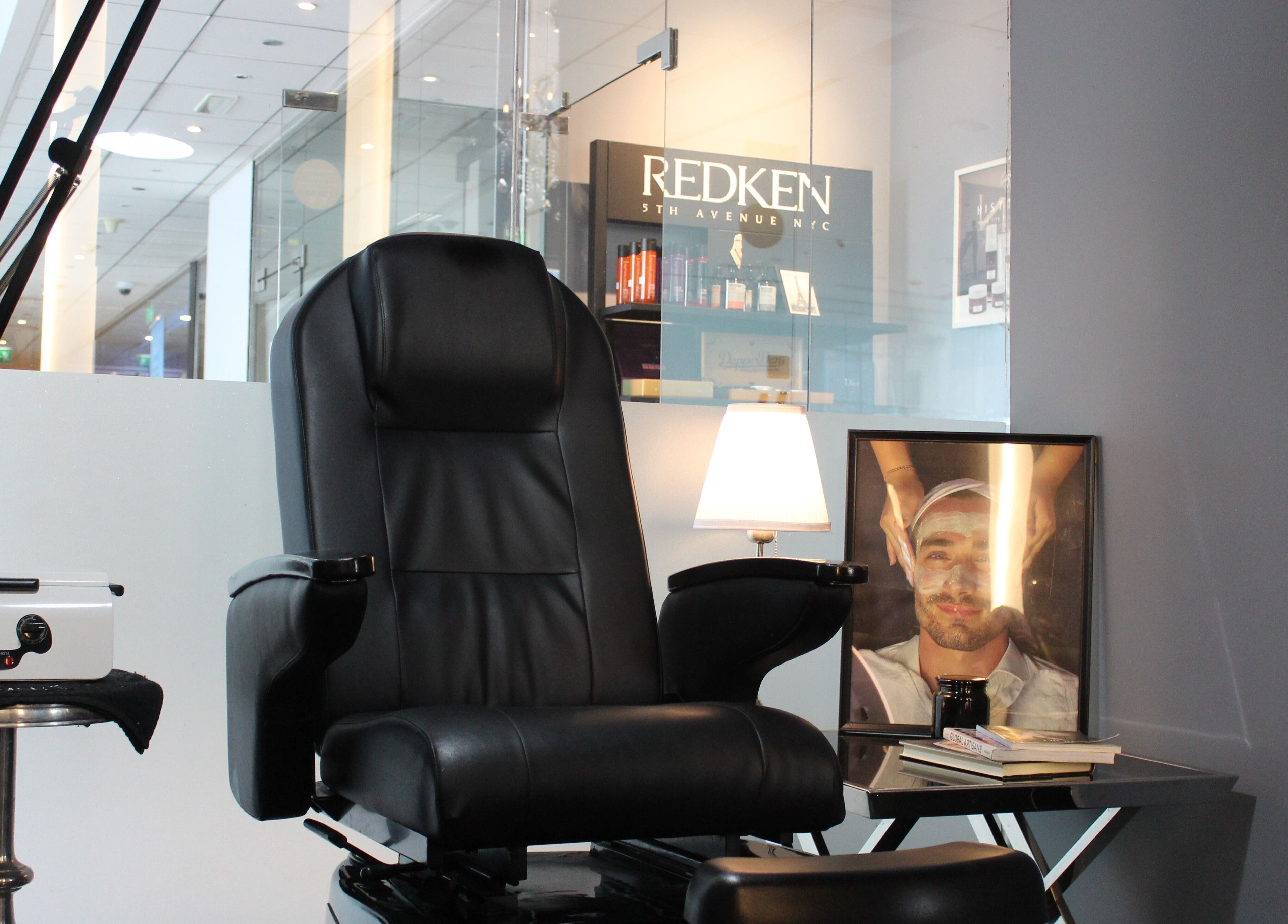 Luxurious barber chair at The Gentlemen's Lounge, a premier wellness venue in Dubai, Dubai, AE.