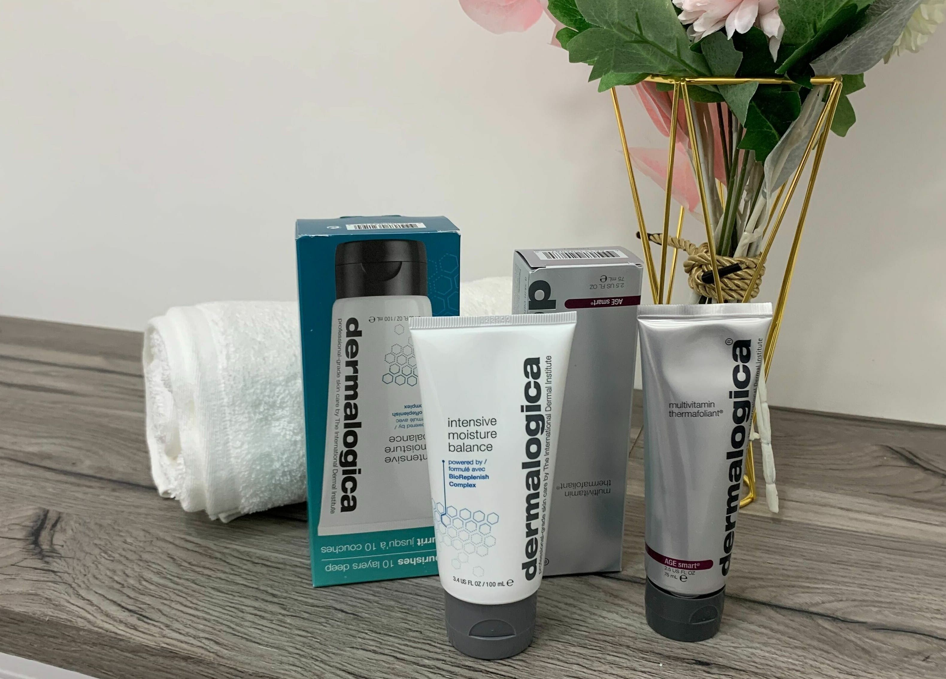 Sudan Angel in London, England features Dermalogica skincare products on a wooden shelf.