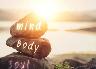 Serene rocks with 'mind, body, soul' words at InsideOut - Body Therapy, Edenvale, Gauteng, ZA.