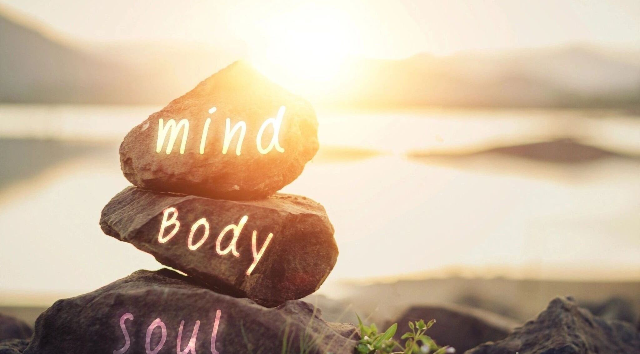 Serene rocks with 'mind, body, soul' words at InsideOut - Body Therapy, Edenvale, Gauteng, ZA.