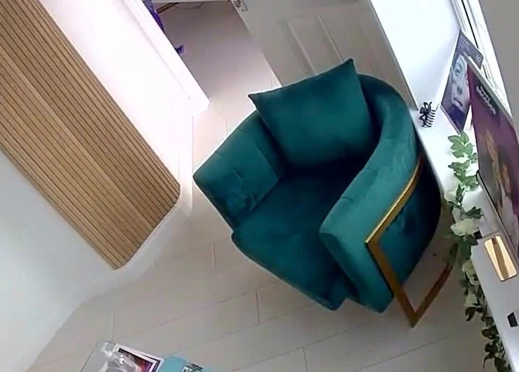 Elegant teal chair and decor at Ely Spmu & Aesthetic Clinic, Ely, England, GB, creating a serene ambiance.