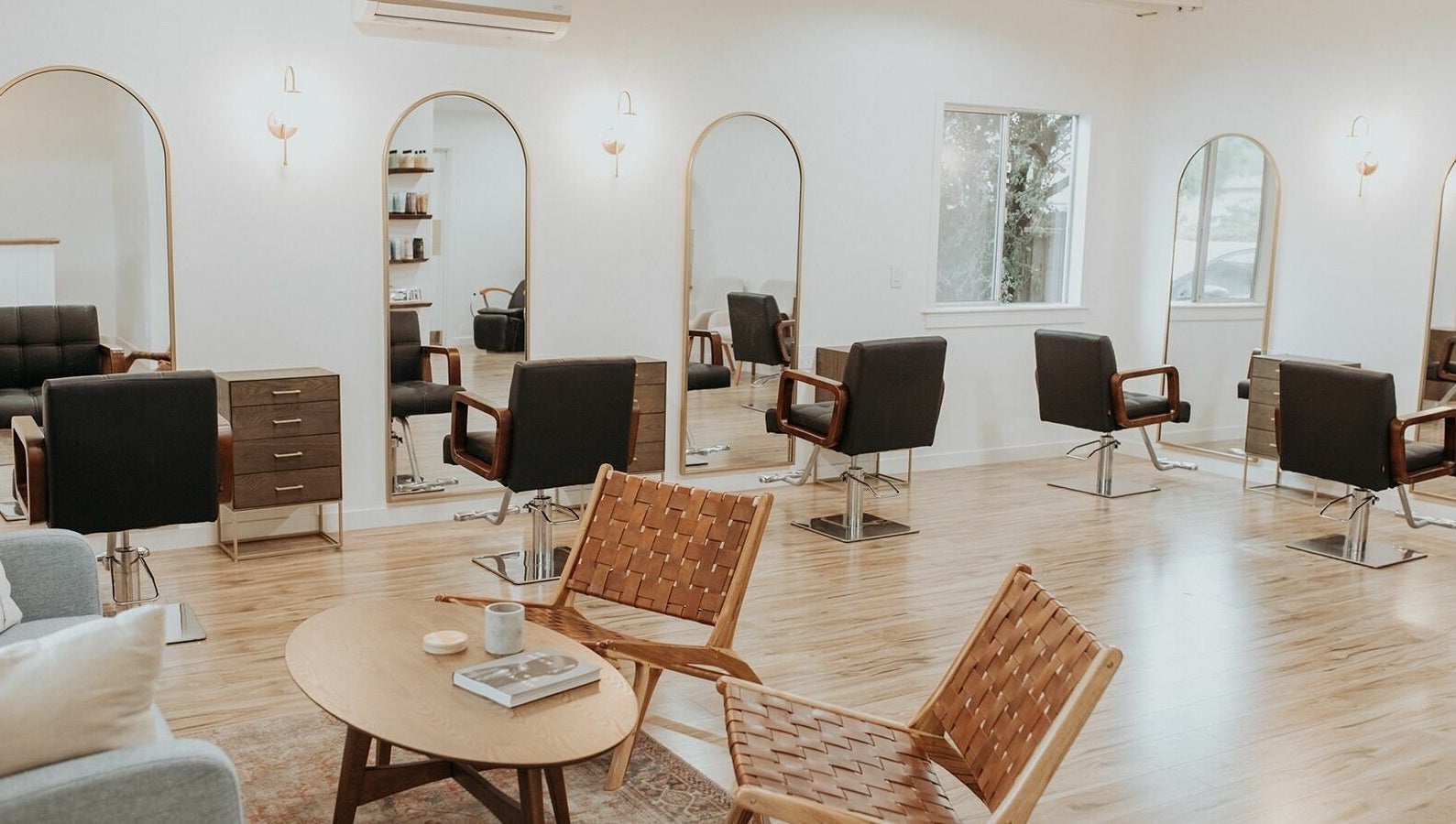 Chic salon chairs and mirrors in Boheme, Ojai, California, US, reflecting modern beauty ambiance.