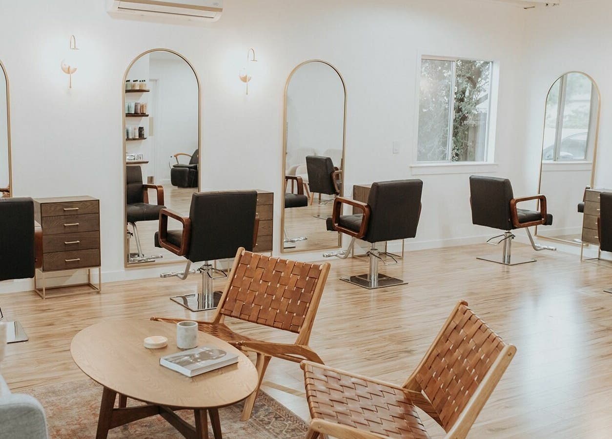Chic salon chairs and mirrors in Boheme, Ojai, California, US, reflecting modern beauty ambiance.
