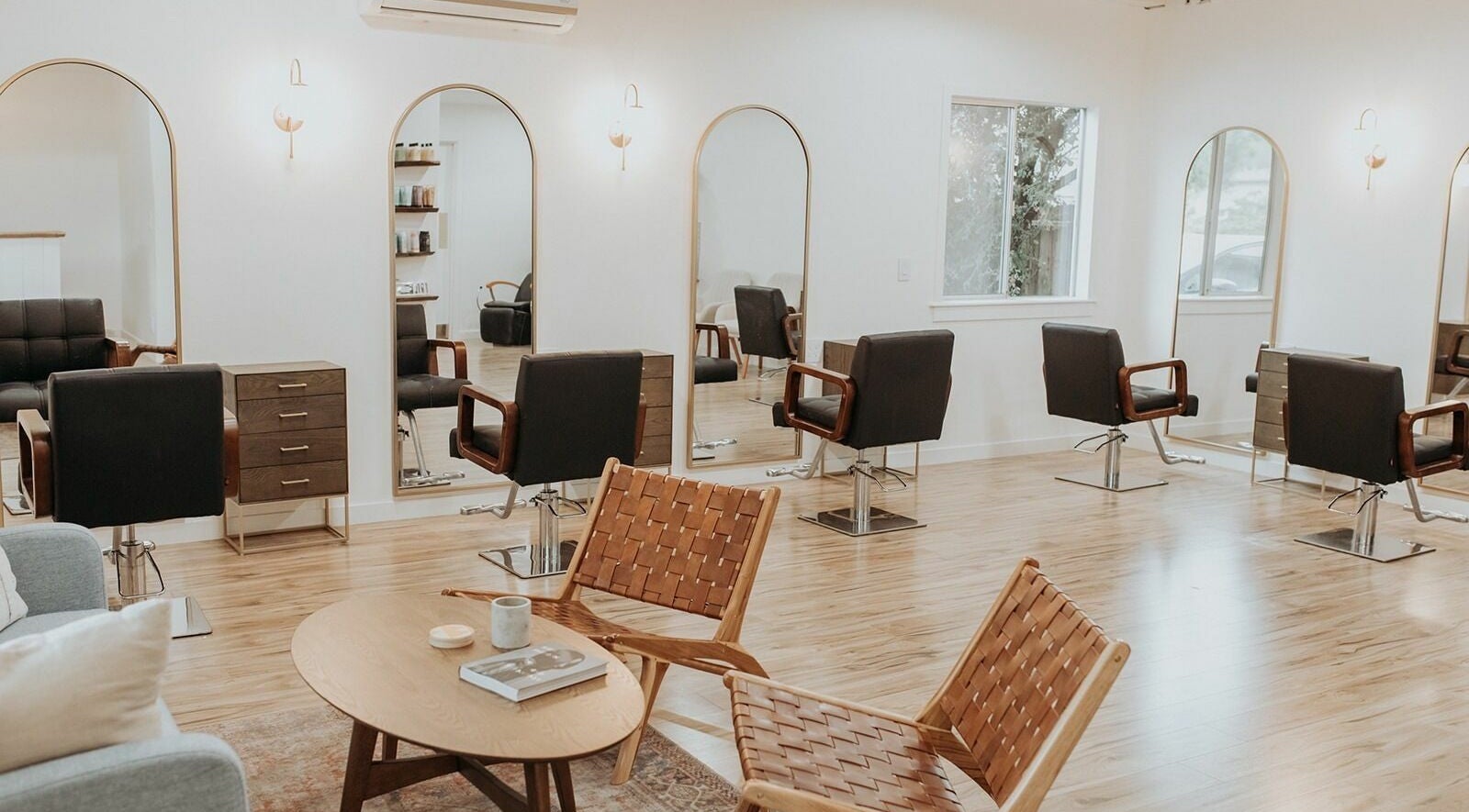 Chic salon chairs and mirrors in Boheme, Ojai, California, US, reflecting modern beauty ambiance.