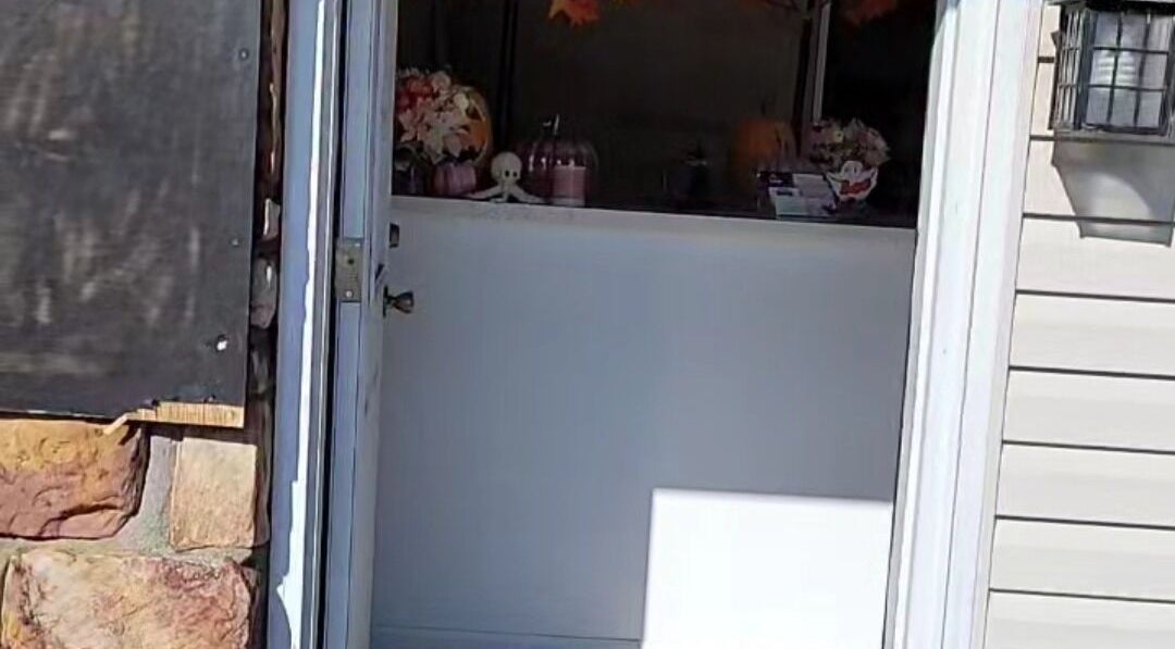 View of Doll Houz Nail Suite entrance in Conway, Arkansas, US with warm seasonal decor.