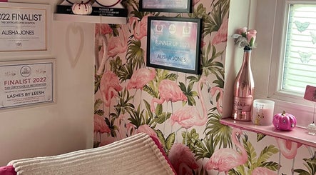 Awards and decor at Lashes By Leesh Witney, Witney, England, GB with pink flamingo theme.