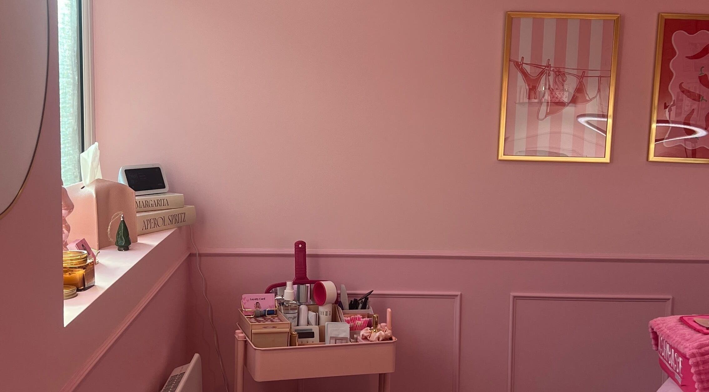 Chic pink interior at Lashes By Leesh Witney, featuring elegant decor and beauty essentials, Witney, England, GB.
