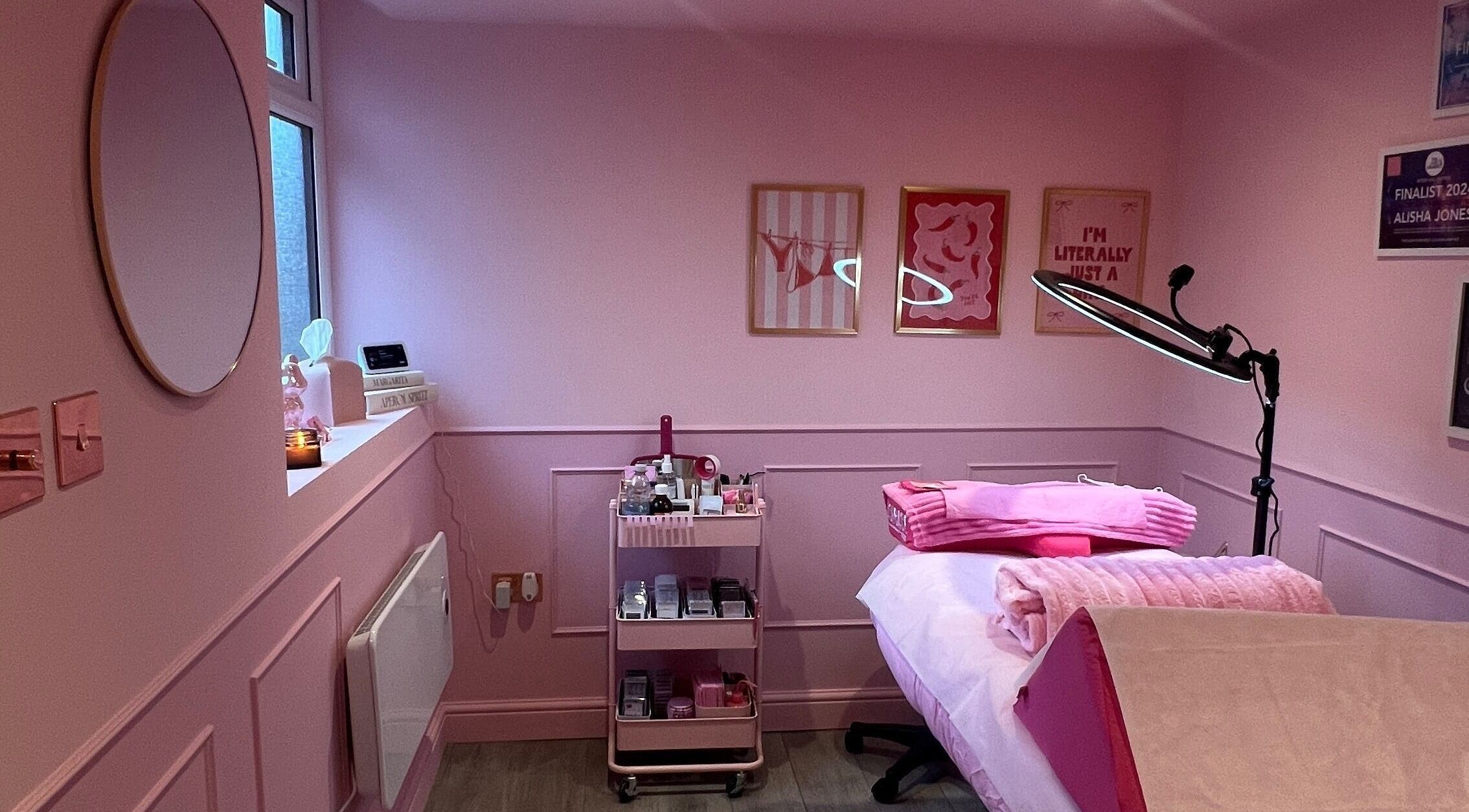 Lashes By Leesh Witney beauty room with pink decor and treatment bed, Witney, England, GB.