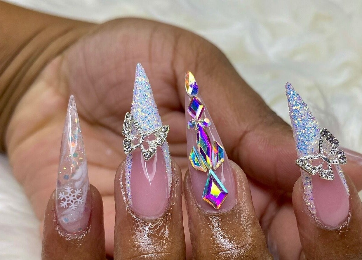 Intricate butterfly and snowflake nail art at Glam Nails by Sharon Melamu, Kuruman, Northern Cape, ZA.