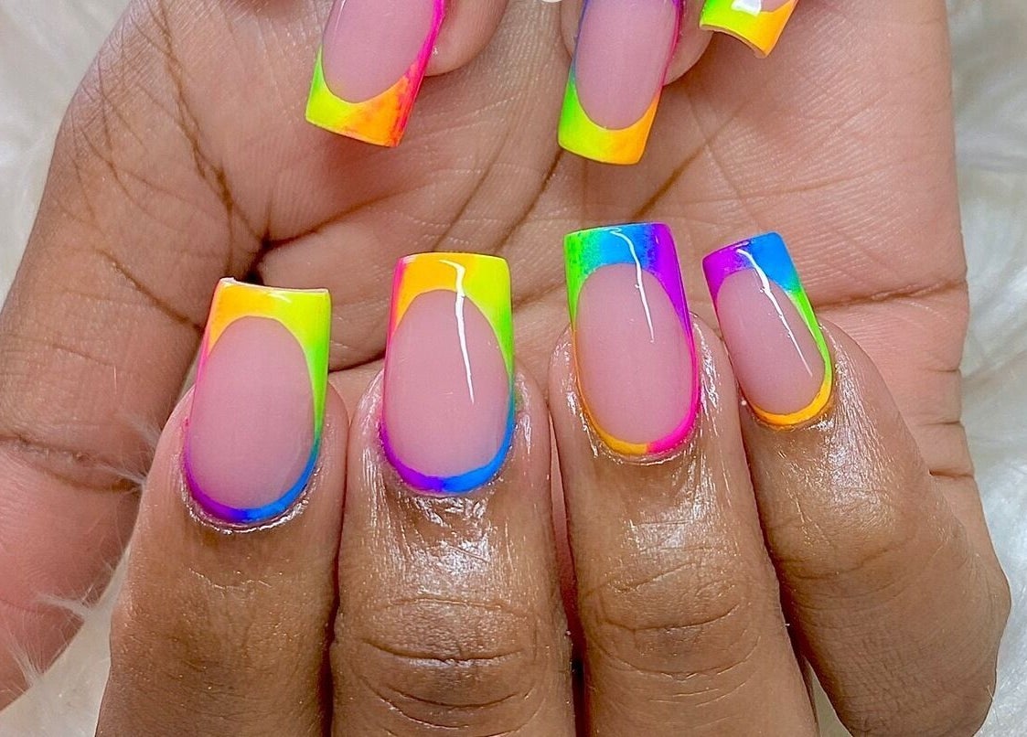 Vibrant rainbow nail art at Glam Nails by Sharon Melamu in Kuruman, Northern Cape, ZA.