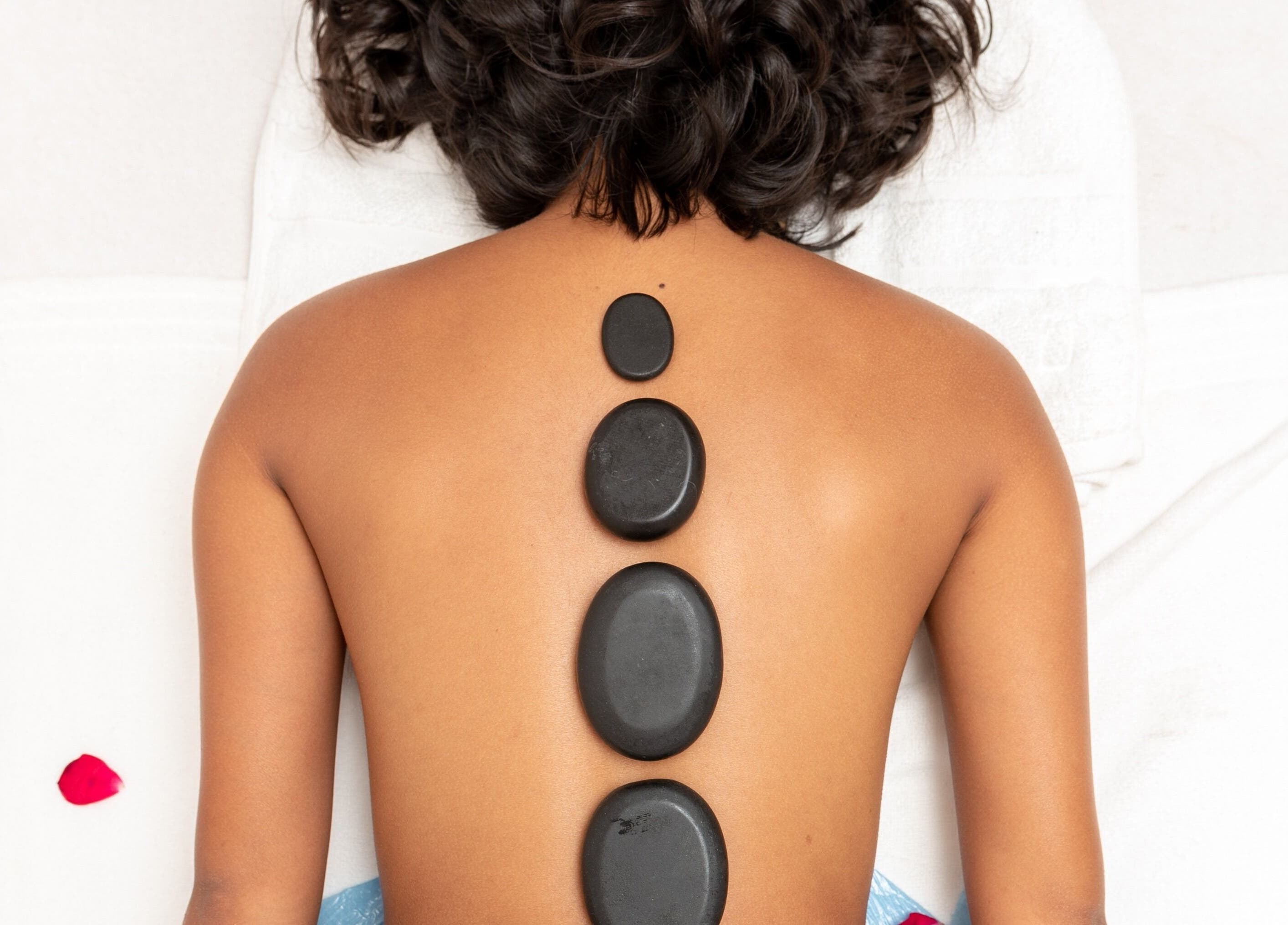 Hot stone massage at Elegante Wellness Centre, Central Flacq, Flacq District, MU for ultimate relaxation.