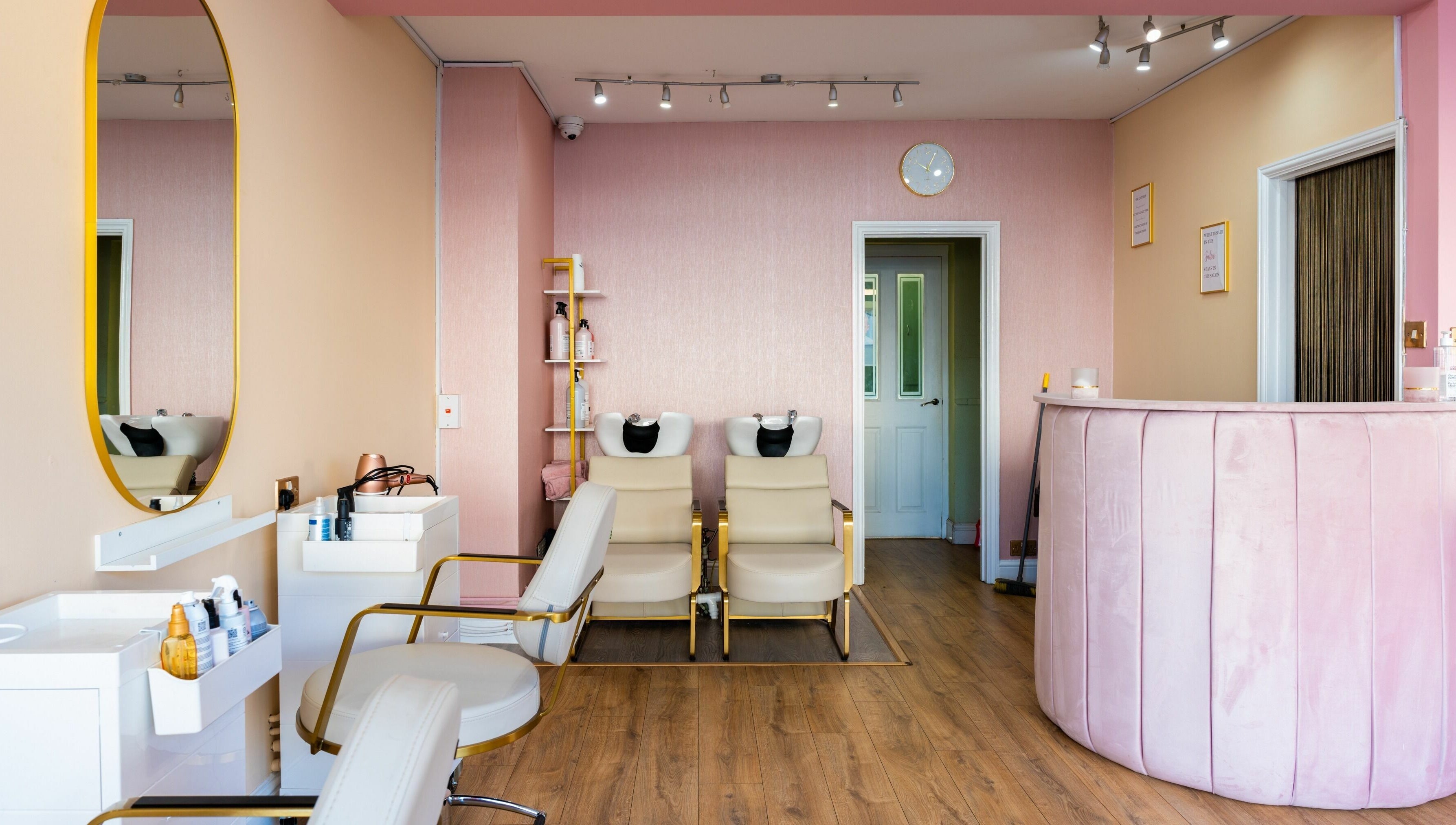 Modern salon interior at Head Start in Swanscombe, England, GB with stylish decor and plush seating.