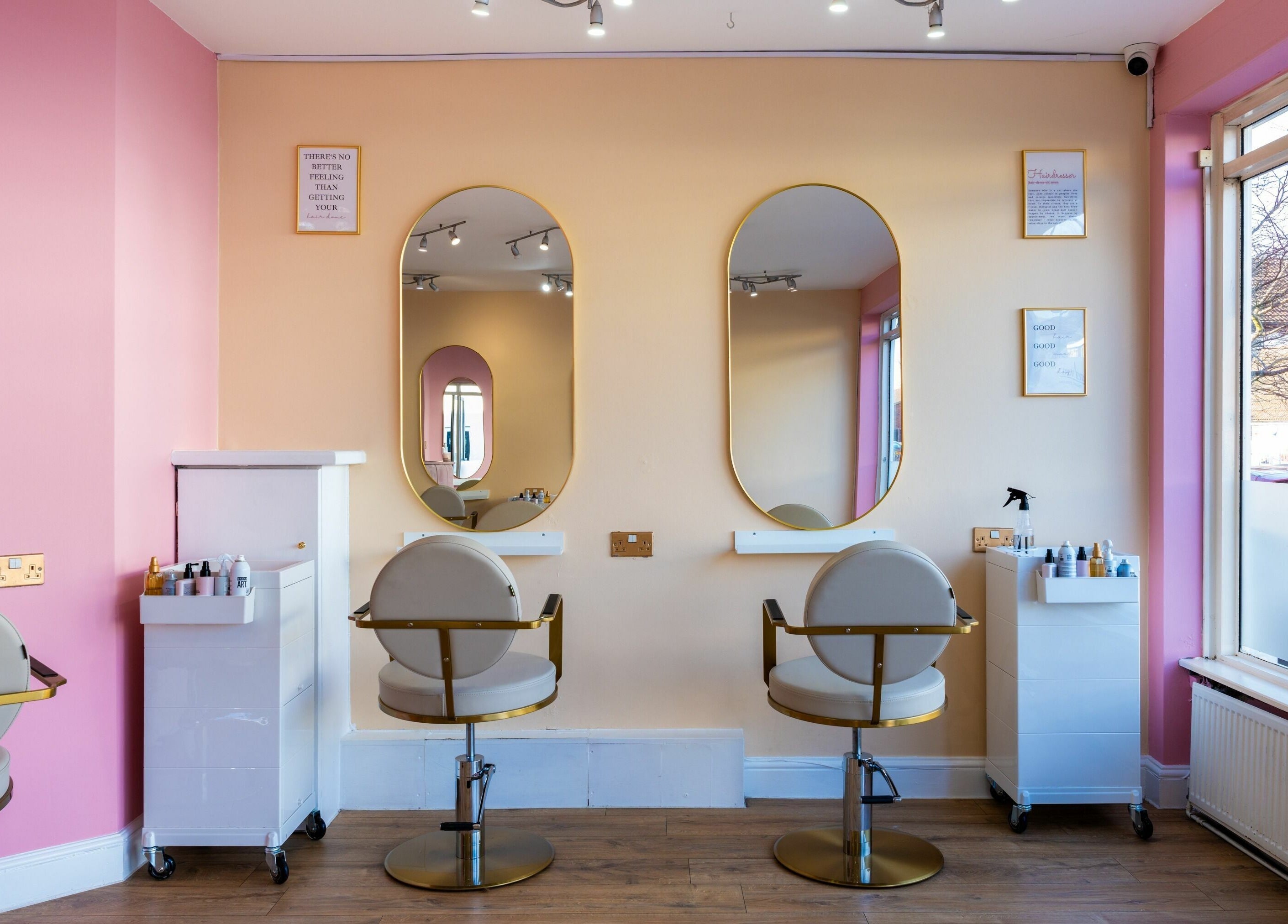 Modern salon setup at Head Start, Swanscombe, England, GB with stylish chairs and mirrors in a cozy ambiance.