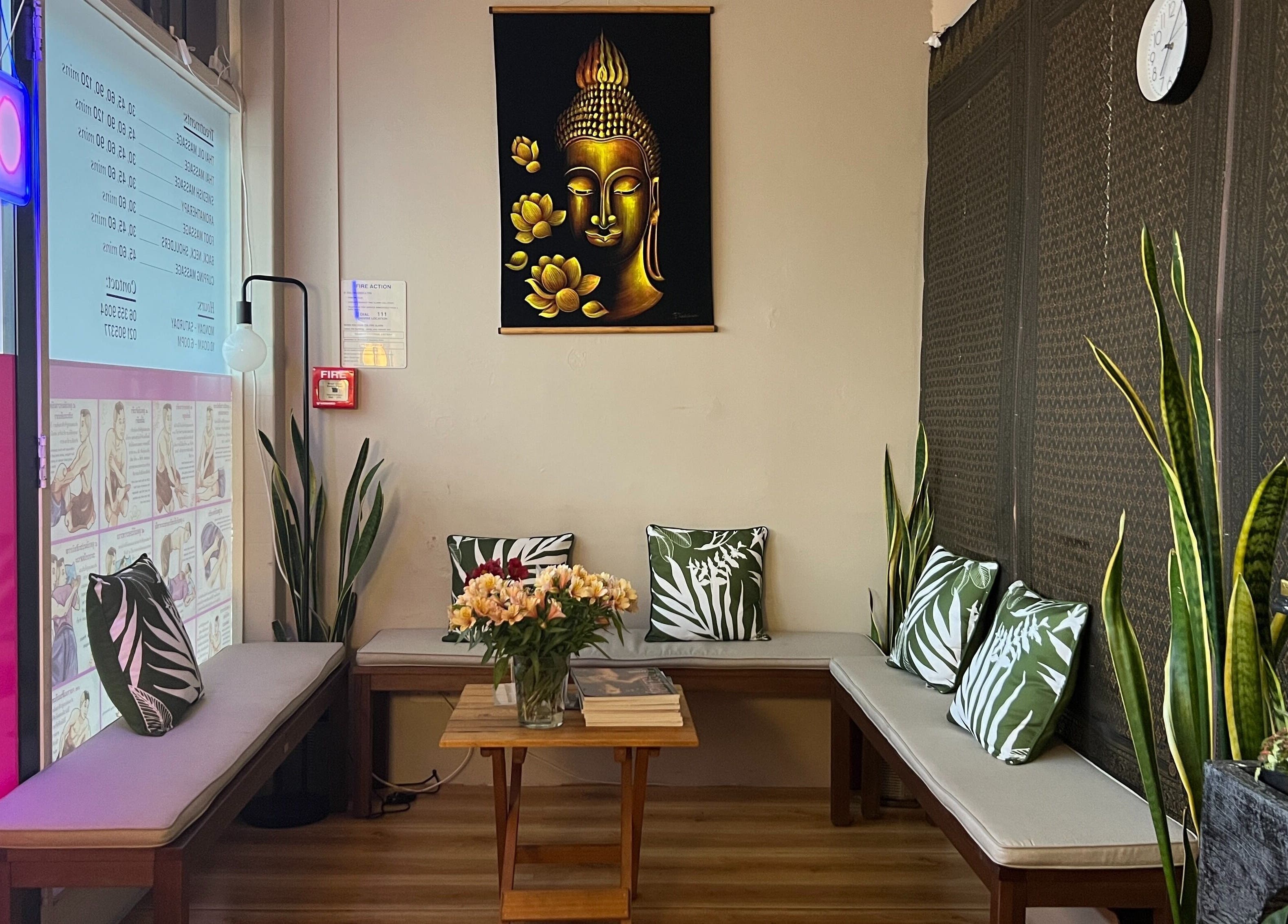 Peaceful seating area with Buddha art at Chantara Massage At 351 Broadway Avenue Terrace End, Palmerston North, NZ.