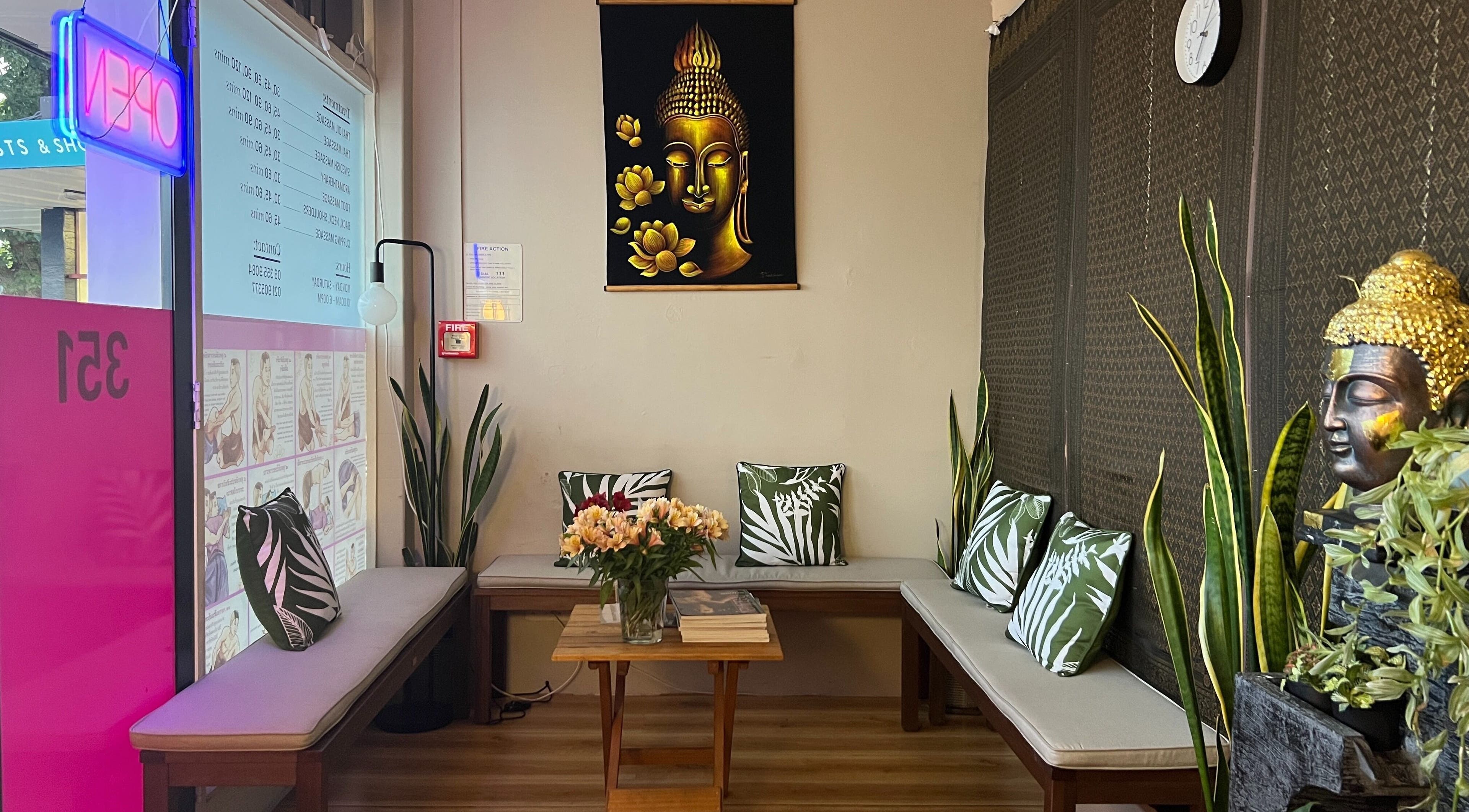 Peaceful seating area with Buddha art at Chantara Massage At 351 Broadway Avenue Terrace End, Palmerston North, NZ.