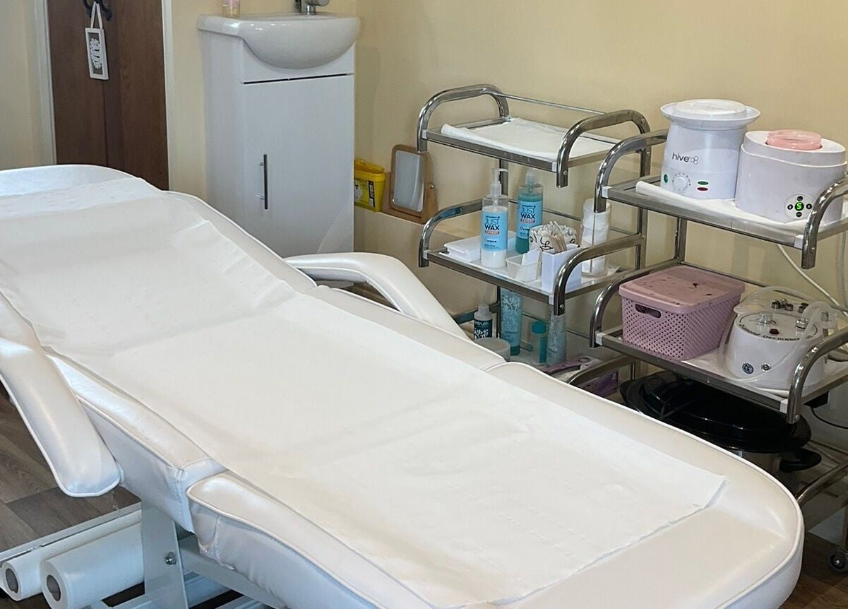 Relaxing spa treatment room at La Bonne Vie, Cawood, England, GB, featuring a comfortable treatment bed.