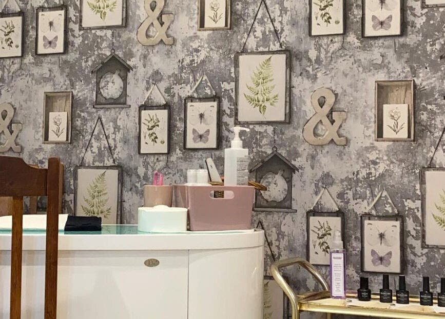 Stylish wall decor and nail care setup at Debeaut by Della, Havant, England, GB.