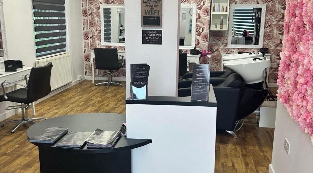 Interior view of K&E Pro Aesthetics Ltd in Bar Hill, England, showcasing stylish decor and professional beauty stations.