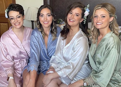Group of women in satin robes at Shannon Mackay Makeup & Beauty, Invergordon, Scotland, GB.