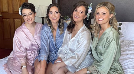 Group of women in satin robes at Shannon Mackay Makeup & Beauty, Invergordon, Scotland, GB.