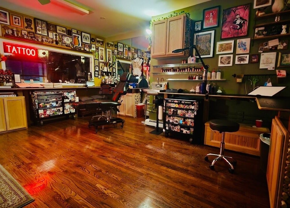 Inviting tattoo studio at Obscura - Art, Tattoo + Body Mod. Studio, Long Beach, New York, US, decorated with art.
