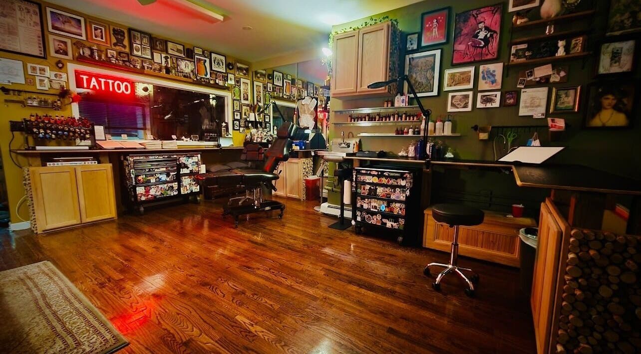 Inviting tattoo studio at Obscura - Art, Tattoo + Body Mod. Studio, Long Beach, New York, US, decorated with art.