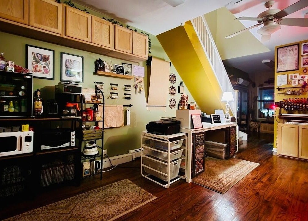 Warm interior of Obscura - Art, Tattoo + Body Mod. Studio in Long Beach, New York, US showcasing eclectic design.