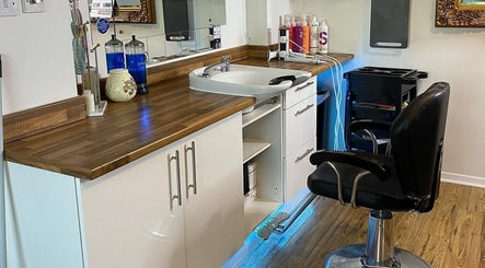 Chic salon station at Amy Rawlings Hairdressing in Worthing, England, GB. Features a modern chair and stylish counter.