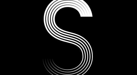 Stylized 'S' logo for Sofia Sundberg Hair in Hlavní město Praha, CZ, on a black background.