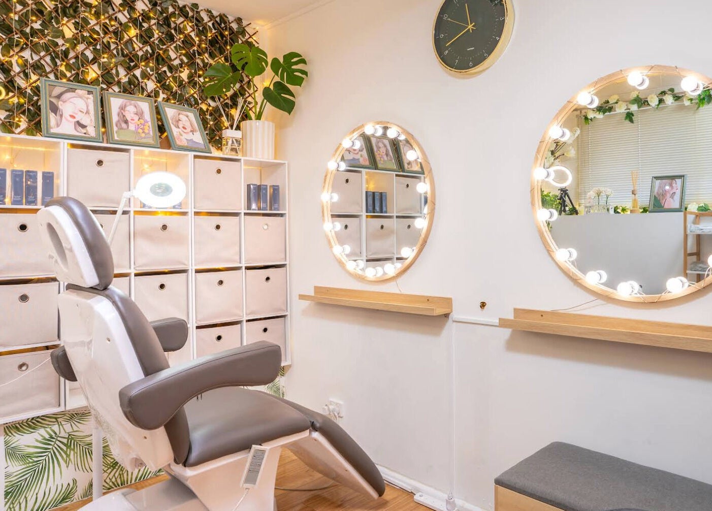 Elegant salon interior at Sienna Beauty Bar in Melbourne, Victoria, AU with stylish decor and lit mirrors.