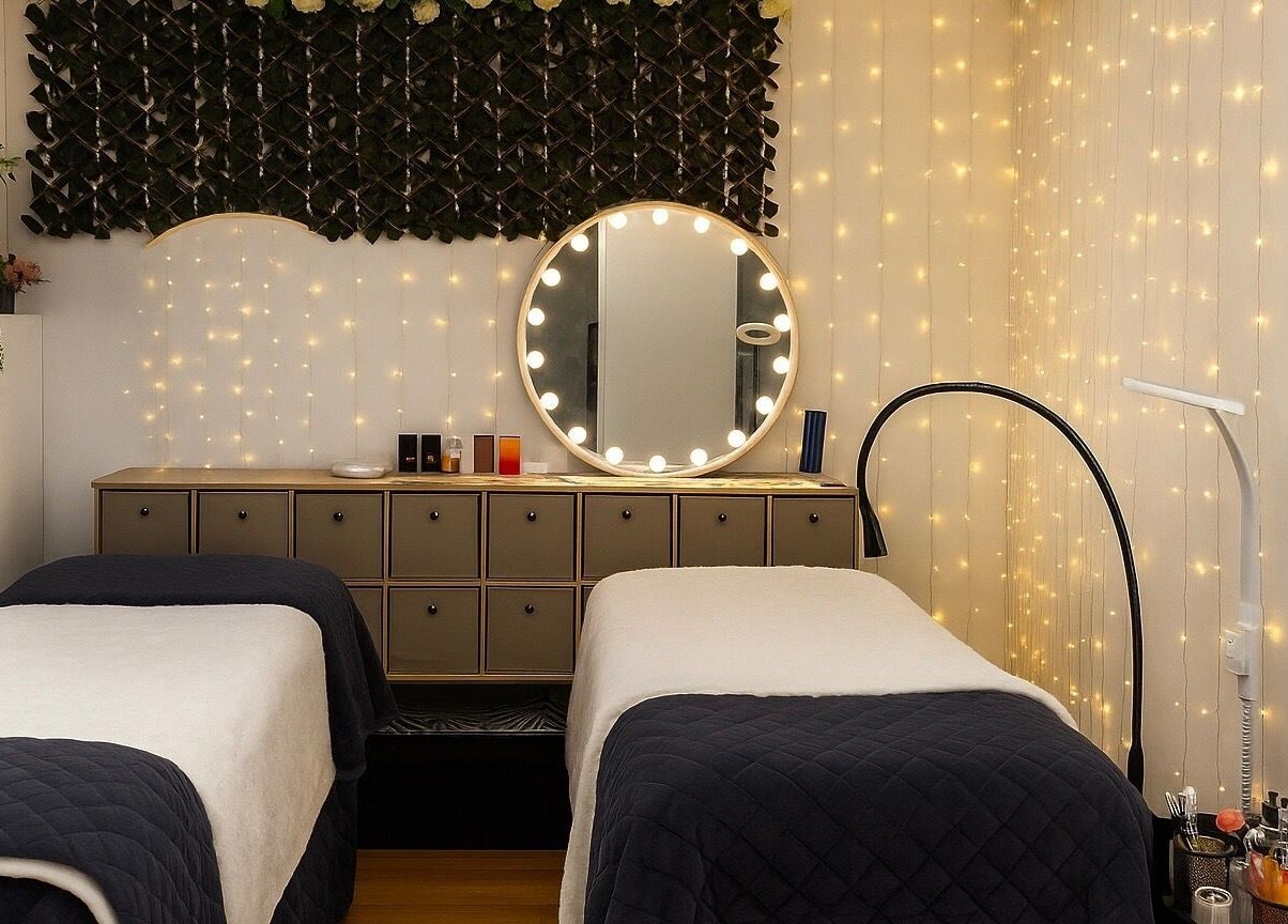 Elegant treatment room at Sienna Beauty Bar, Melbourne, Victoria, AU with cozy lighting and modern decor.