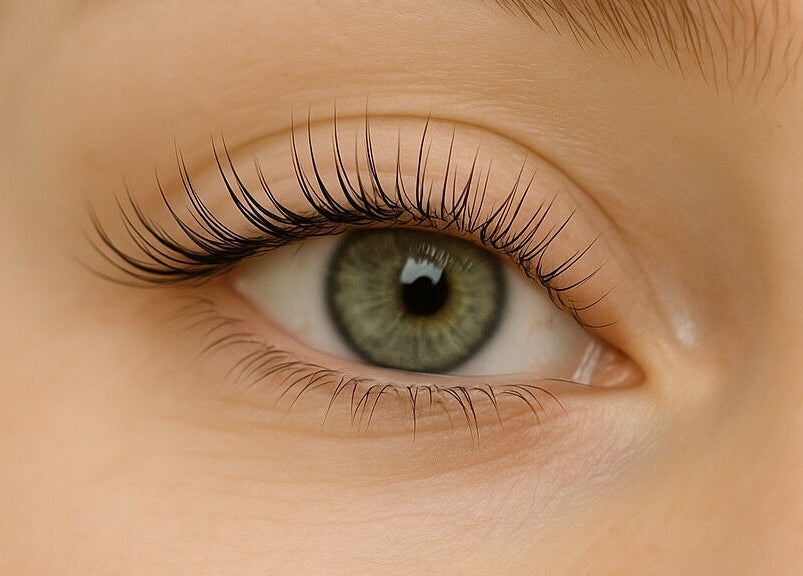 Close-up of an eye with lush lashes at [SE:RE] Sienna Beauty Bar, Melbourne, Victoria, AU.