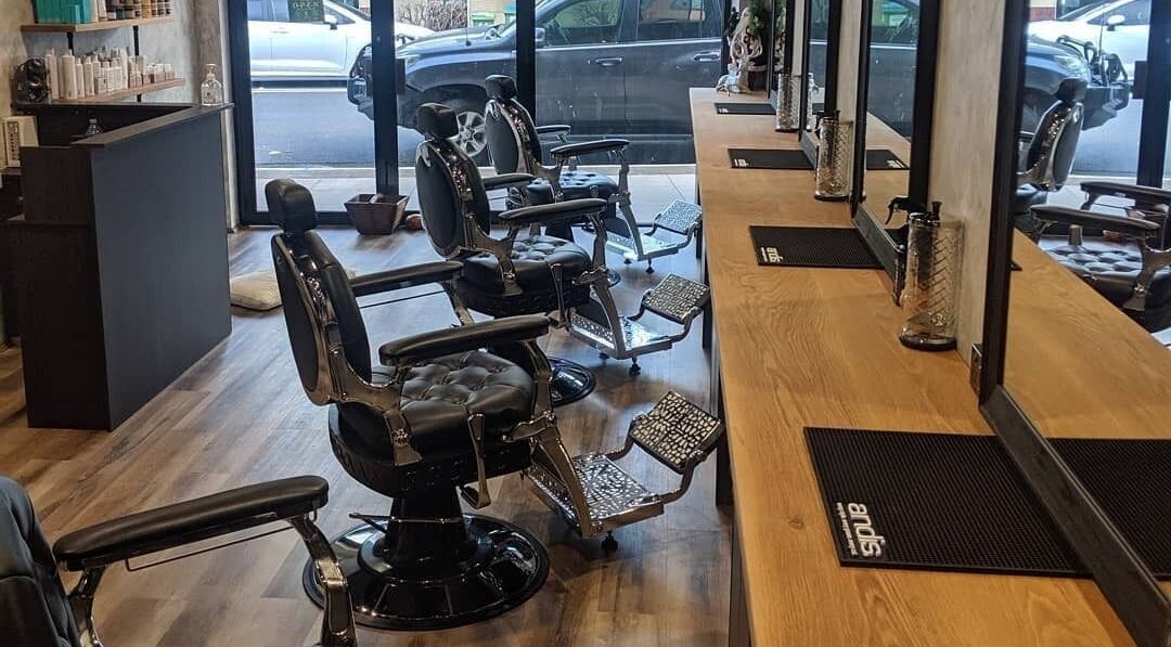 Modern barber chairs at Ace & Co Barbers, Randwick, New South Wales, AU, showcasing sleek design and comfort.