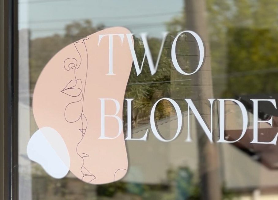 Elegant Two Blondes logo on window at Melbourne, Victoria, AU beauty venue entrance.