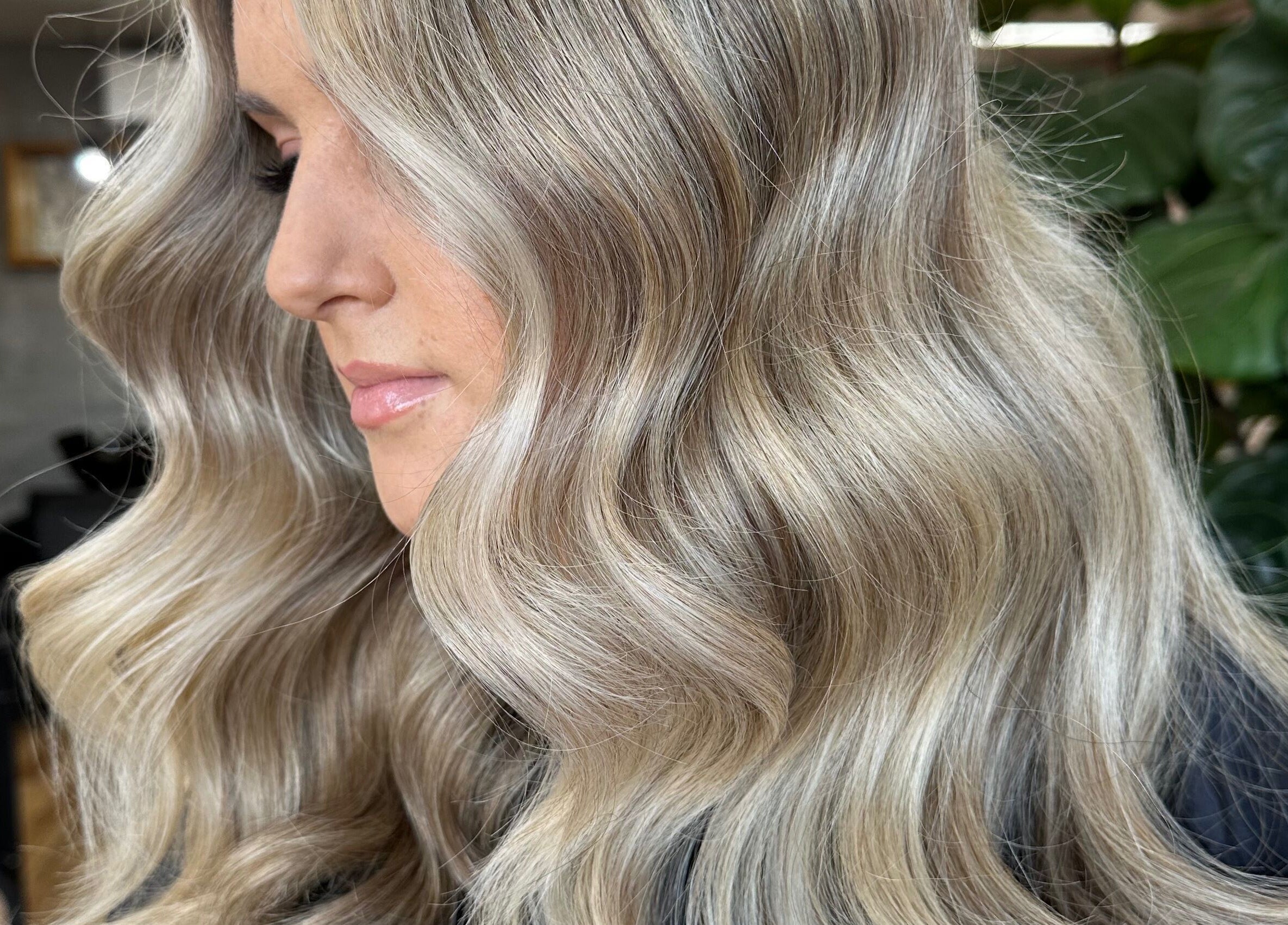 Elegant wavy blonde hairstyle at Two Blondes in Melbourne, Victoria, AU.