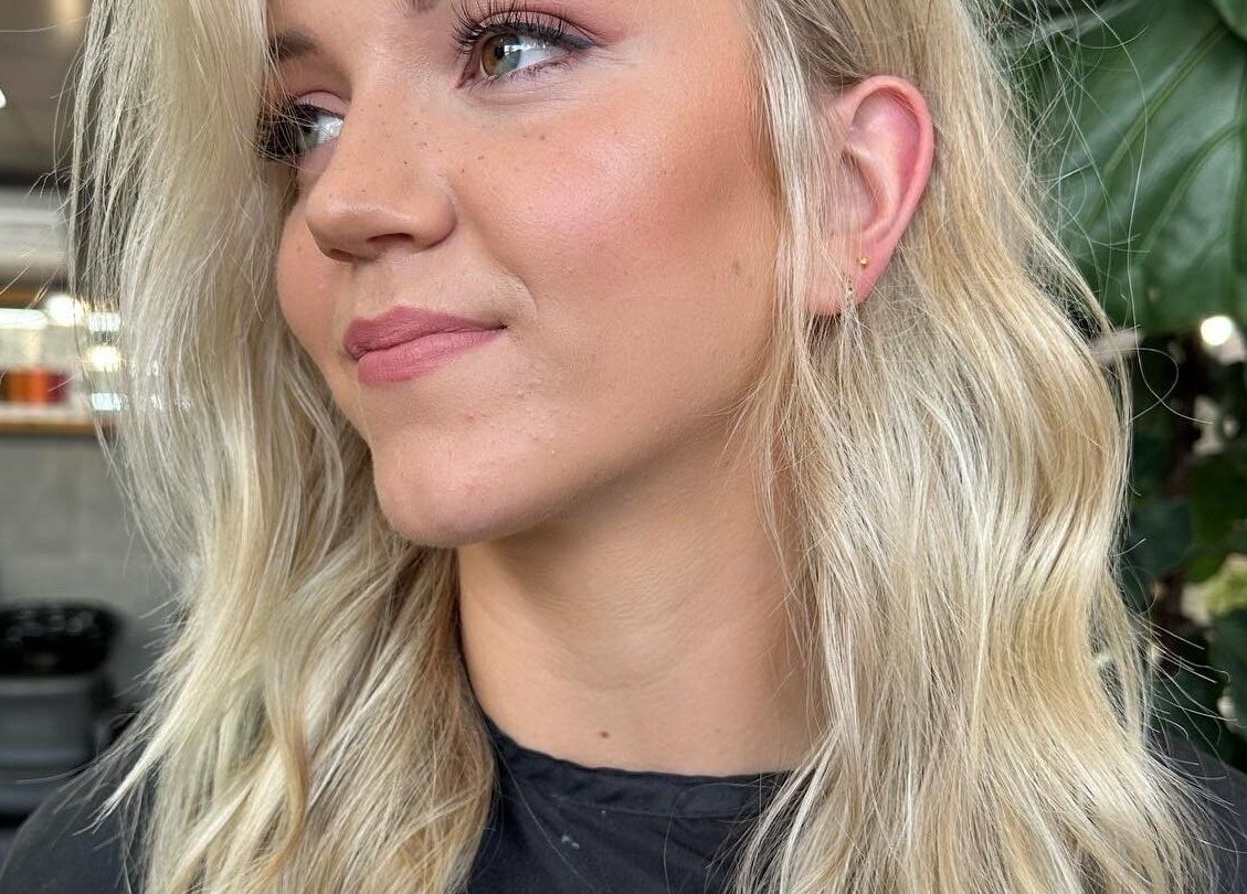 Woman with styled blonde hair at Two Blondes, Melbourne, Victoria, AU hair salon.