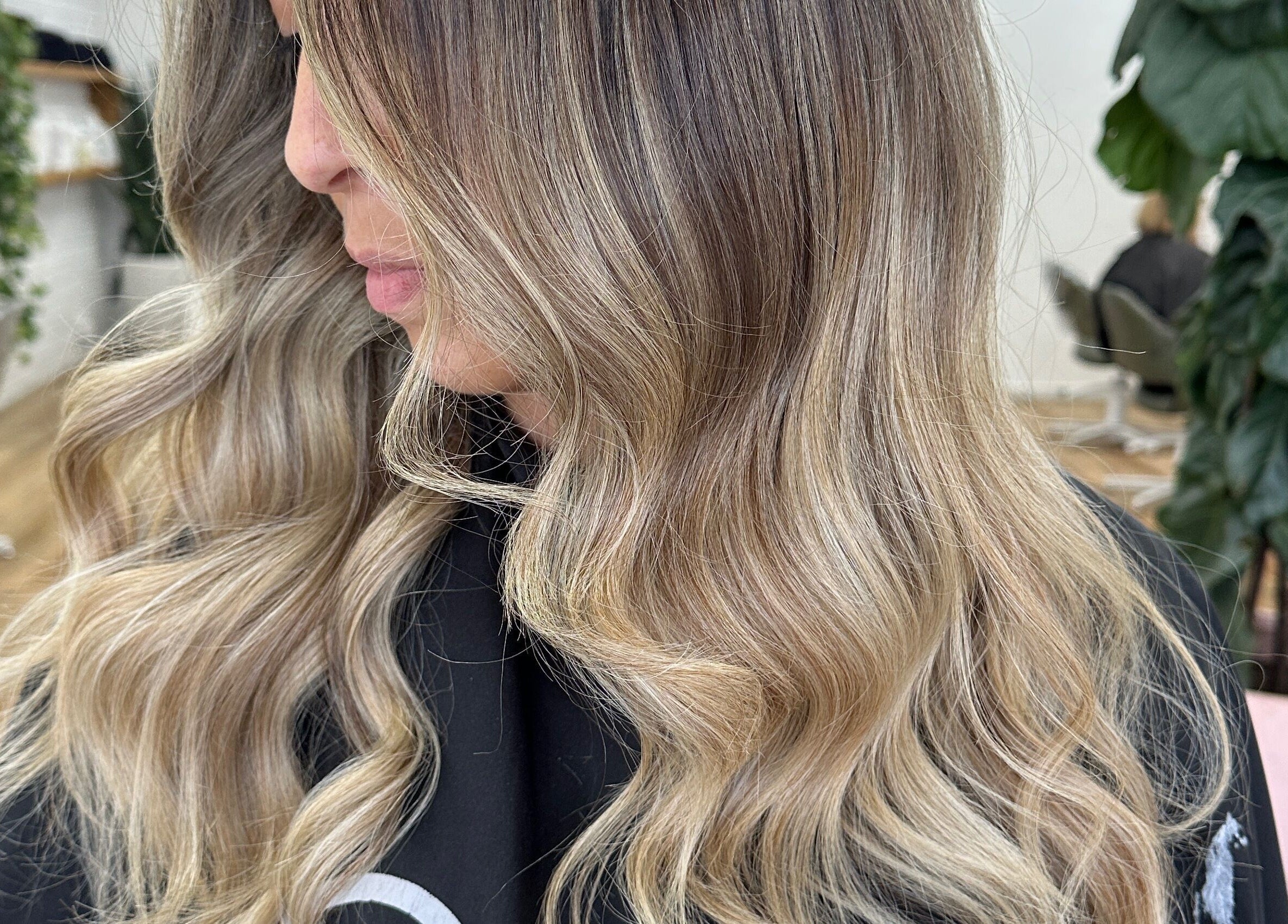 Stylish blonde hair waves at Two Blondes salon in Melbourne, Victoria, AU.