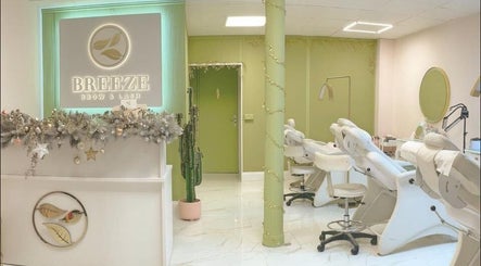 Interior of Breeze Brow and Lash, Glasgow, Scotland, GB, featuring modern design and comfortable beauty chairs.