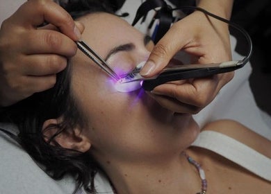 Lash extension application at Breeze Brow and Lash, Glasgow, Scotland, GB. Precision detail with expert lighting.