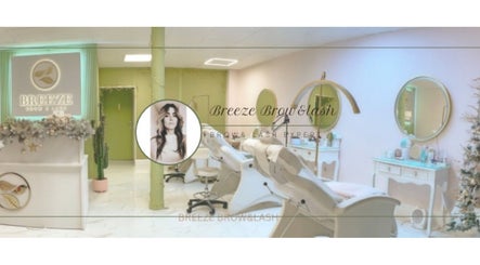 Breeze Brow and Lash's elegant spa interior in Glasgow, Scotland, GB, with luxurious decor and treatment chairs.