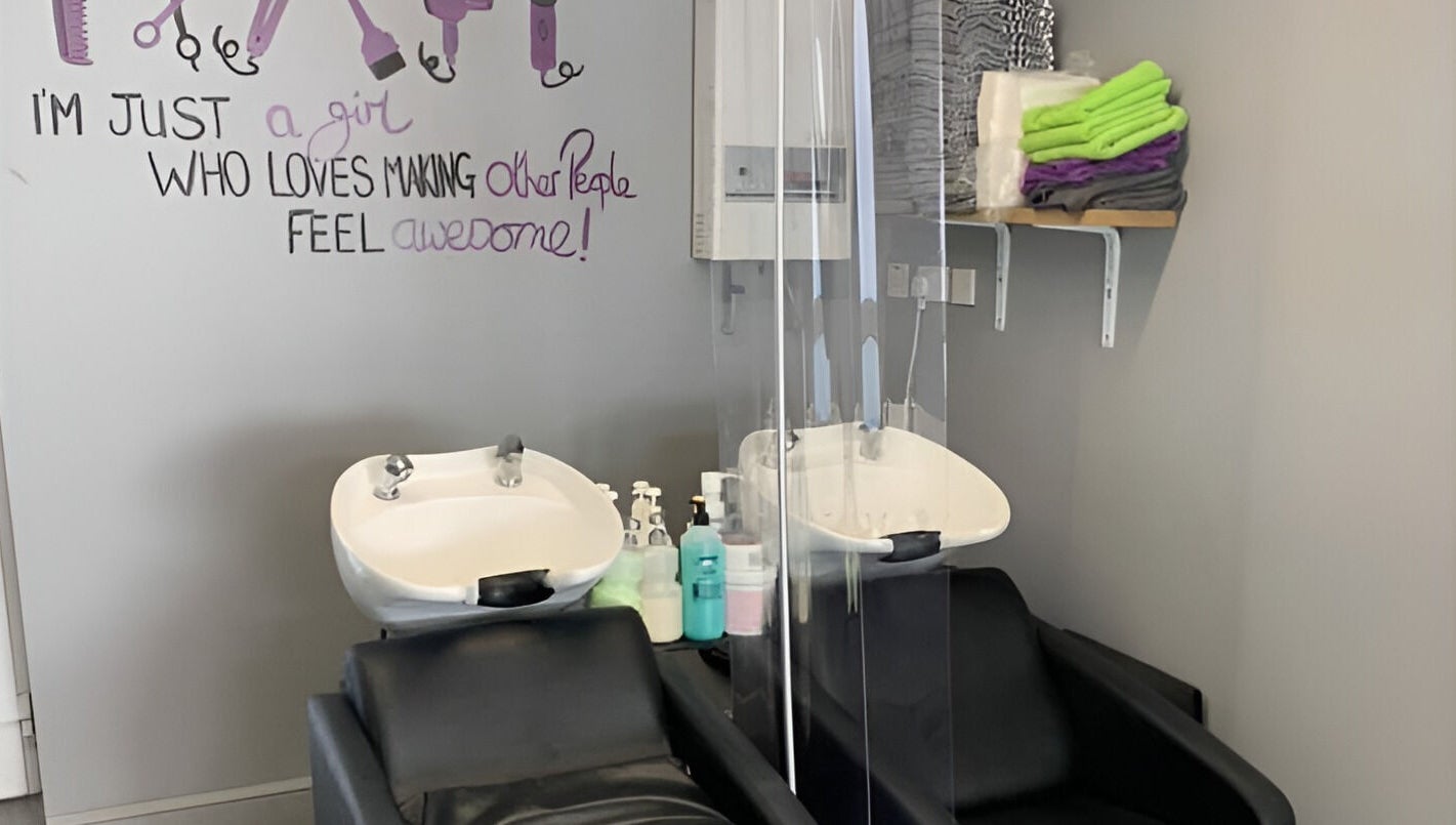 Headlines salon in Ramsey, England, GB features modern wash stations and cozy seating in a vibrant atmosphere.