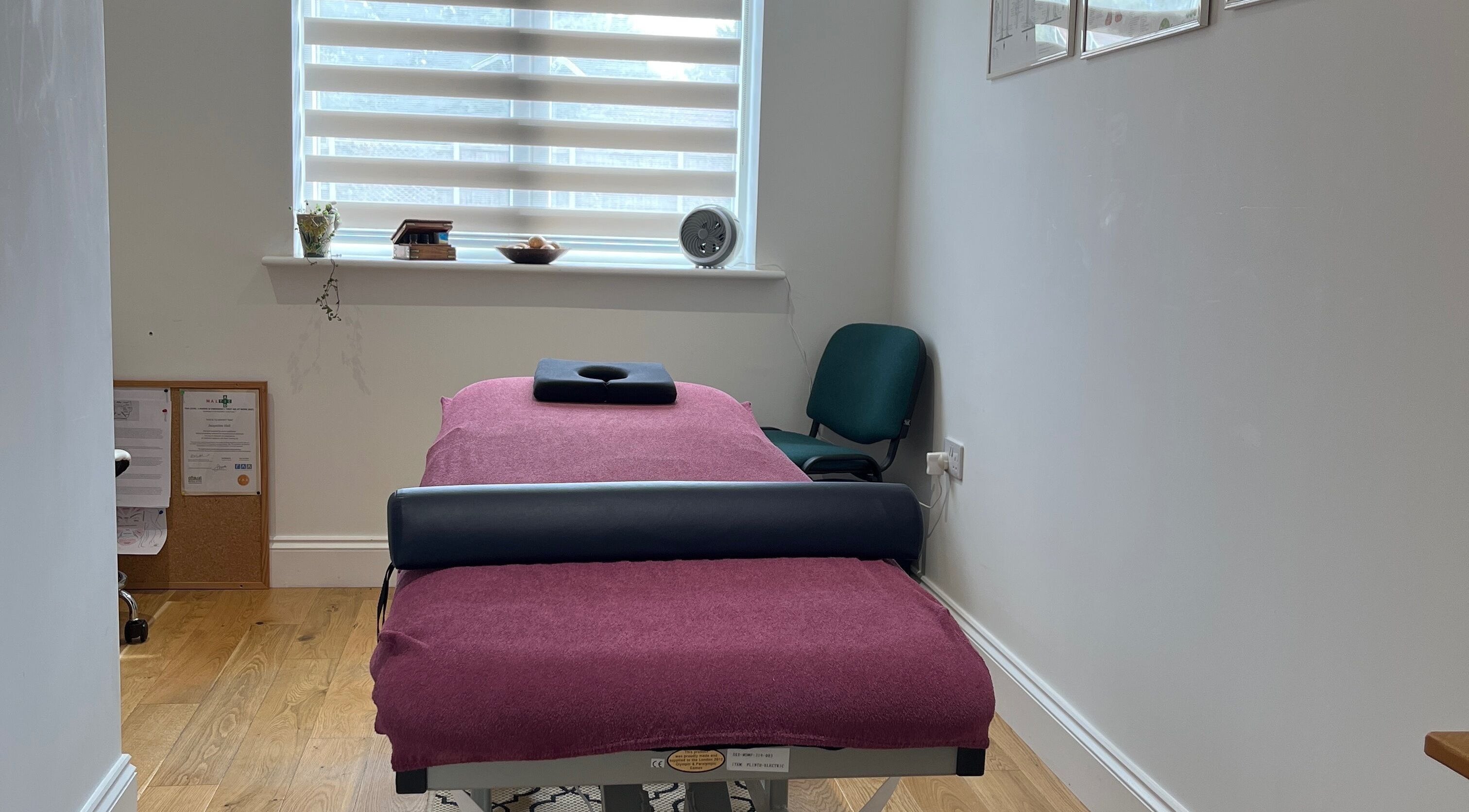 Tranquil therapy room at JH Sport Manual Therapy, Norwich, England, GB. Features a comfortable massage table.