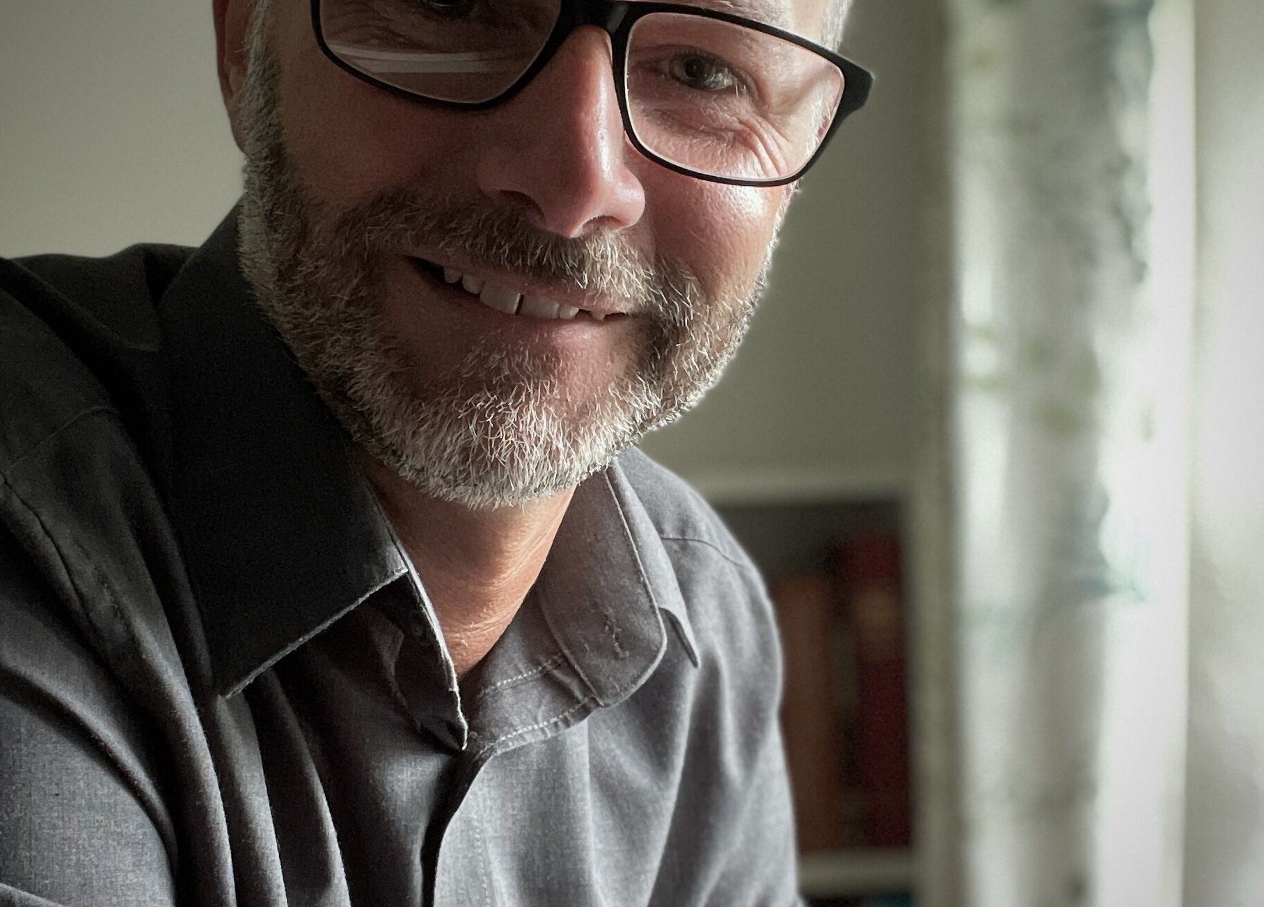 Warm, inviting room at Neil Cox Hypnotherapy, Hayle, England, GB with calming decor and ambient lighting.