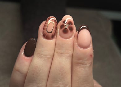 Stylish brown and nude nail art with intricate designs at LEMnails, Leeds, England, GB.