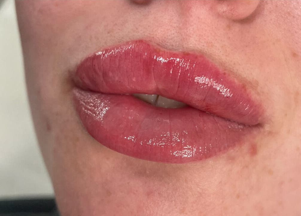 Closeup of glossy, styled lips at All Dolled Up - Leeds, Kippax, England, GB.