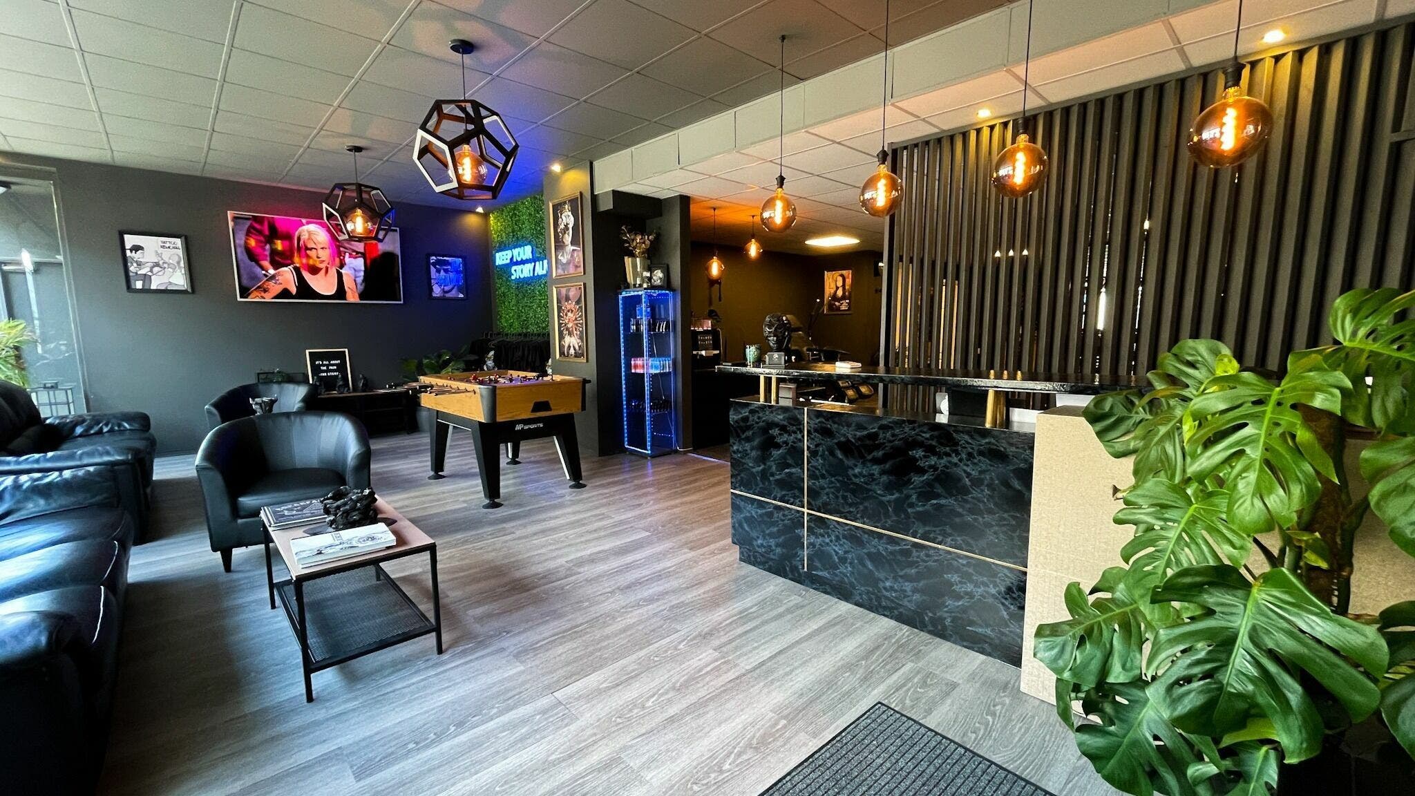 Sophisticated lounge at Kristiansand venue with plants, seating, and stylish decor in Kristiansand, Agder, NO.