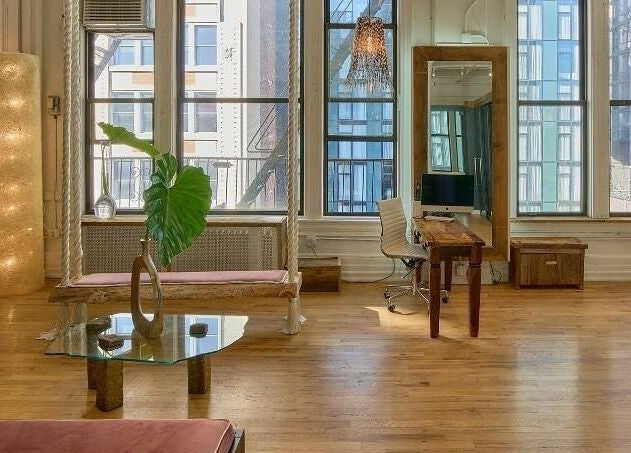 Tranquil Alchemy Space loft with elegant decor and wooden floors in New York, New York, US.